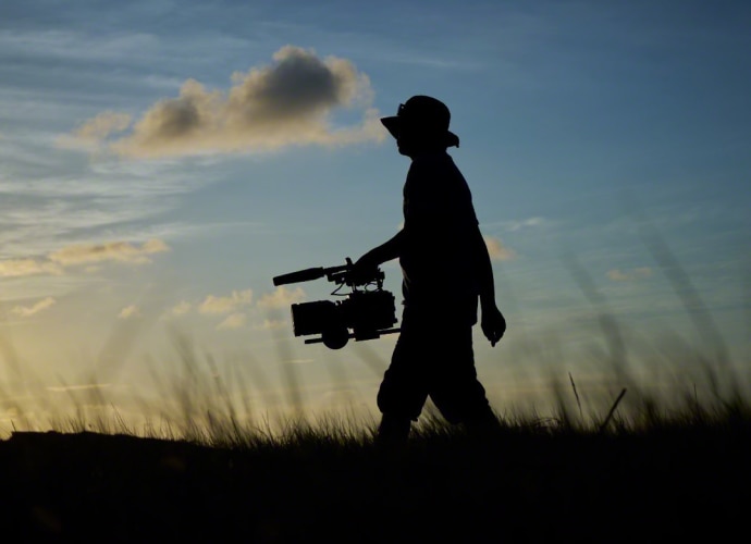 Camera operator shooting with a full-frame Sony cinema camera